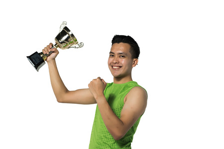 young asian man with trophies isolated in whiteの写真素材