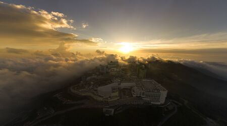 Malaysia Genting Highland with sunset and dramatic cloud city above the cloud. noise are existed in a drone photographyの写真素材