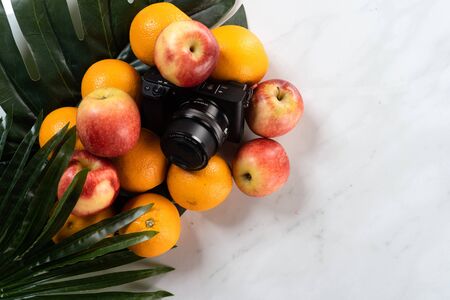oranges and apples with mable backgroundの写真素材