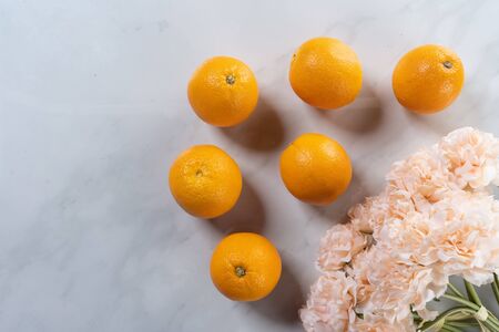 pink flower and orange with marble backgroundの写真素材