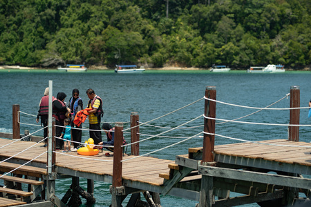 Malaysia - 15 aug 2019, a group of asian family get ready preparing to snookering at the jettyのeditorial素材