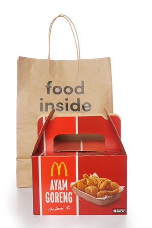 Shah Alam, Malaysia - 1 November 2019, Dah Makan take away paper bag with McDonalds Packaging isolated on a White backgroundのeditorial素材