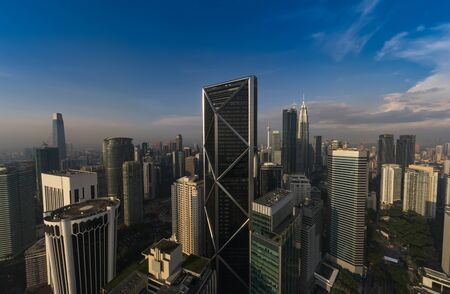 kuala lumpur buildings with dramatic sunrise aerial panorama shotの写真素材