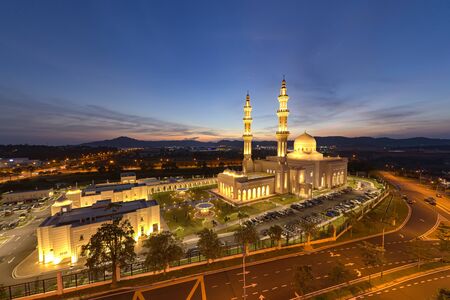 sri sendayan mosque at sendayan negeri sembilan malaysia dramatic blue hour aerial shotの写真素材