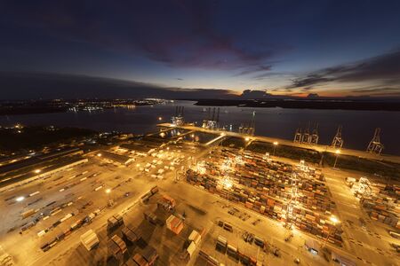 industrial shipping yard aerial dramatic shotの写真素材
