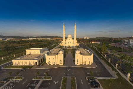 sri sendayan mosque at sendayan negeri sembilan malaysia dramatic blue hour aerial shotの写真素材
