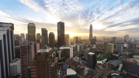 Kuala Lumpur, Malaysia - 10 December 2019. Kuala Lumpur city center aerial shot from bukit bintang and a dramatic sunriseのeditorial素材