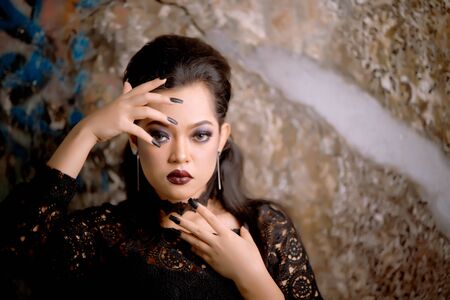 Portrait of an attractive woman with long nailsの写真素材
