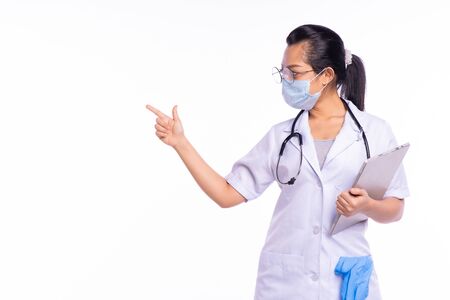 Doctors wear masks while pointing fingers at a white backgroundの写真素材