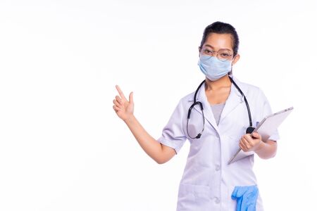 Doctors wear masks while pointing fingers at a white backgroundの写真素材