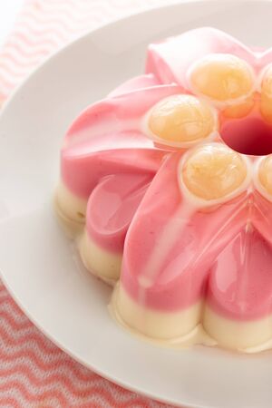 sweet pudding with longan sweetens milk on white backgroundの写真素材