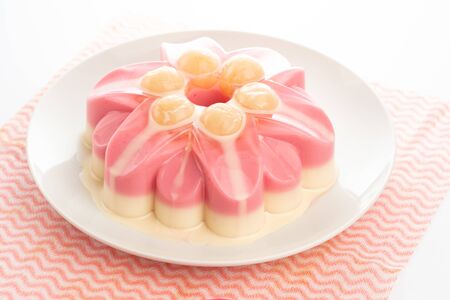 sweet pudding with longan sweetens milk on white backgroundの写真素材