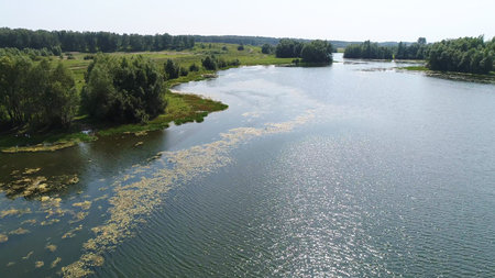 drone flight over the river. beautiful small islands. The settlement near the river