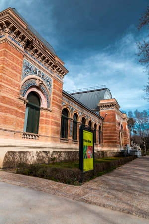 Foto de Madrid, Spain - FEB 17, 2022: The Velazquez Palace is an exhibition hall located in Buen Retiro Park, Madrid, Spain. Built in1883 by Ricardo Velazquez Bosco. - Imagen libre de derechos