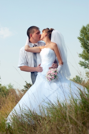 Happy bride and groom outdoorsの写真素材