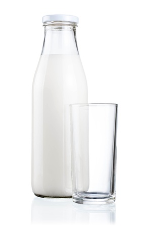 Bottle of fresh milk and blank glass isolated on a white backgroundの写真素材