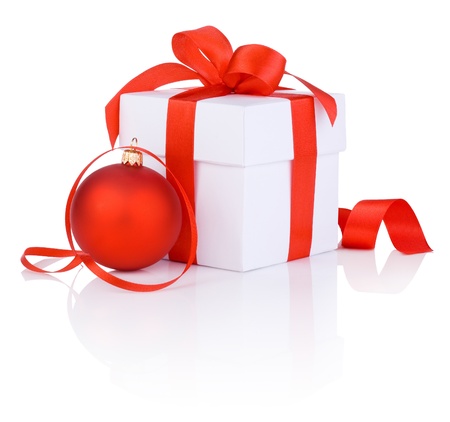 White boxs tied with a red satin ribbon bow and christmas ball Isolated on white backgroundの写真素材