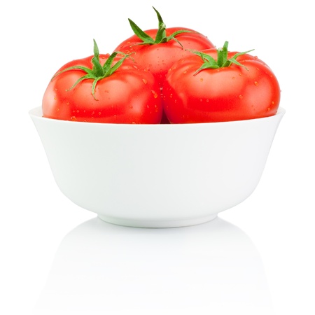 Juicy wet tomatoes in Bowl isolated on white backgroundの写真素材