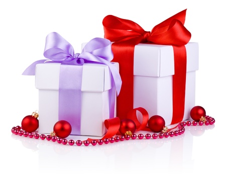 Two White boxs tied with a satin ribbon bow, red Christmas balls and beads Isolated on white backgroundの写真素材