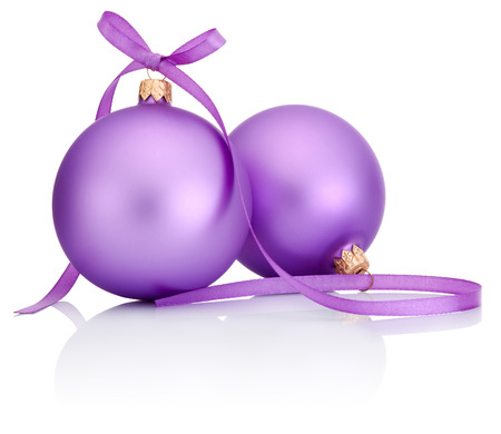 Two purple Christmas Bauble with ribbon bow Isolated on white backgroundの写真素材