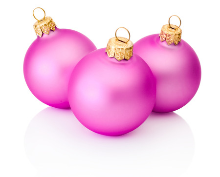 Three pink christmas balls Isolated on white backgroundの写真素材