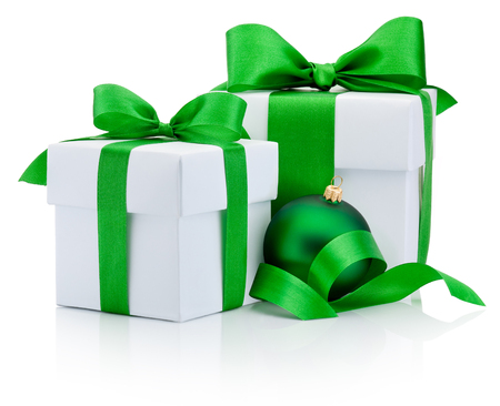 Two gift white boxes tied green ribbon bow and christmas bauble Isolated on white backgroundの写真素材