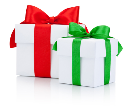 Two white gift box tied green and red ribbon Isolated on white backgroundの写真素材