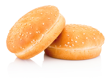 Two hamburger buns with sesame isolated on white backgroundの写真素材