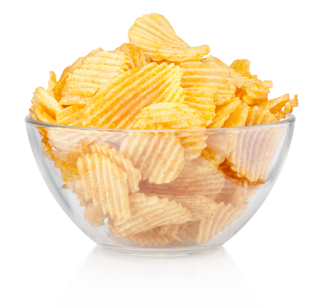 Crinkle cut potato chips in bowl isolated on a white backgroundの写真素材