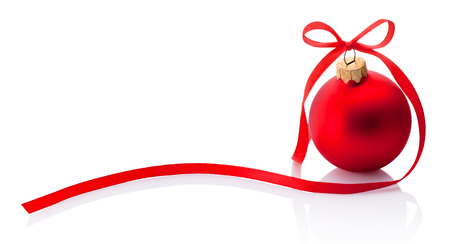 Red Christmas bauble with ribbon bow isolated on white backgroundの写真素材