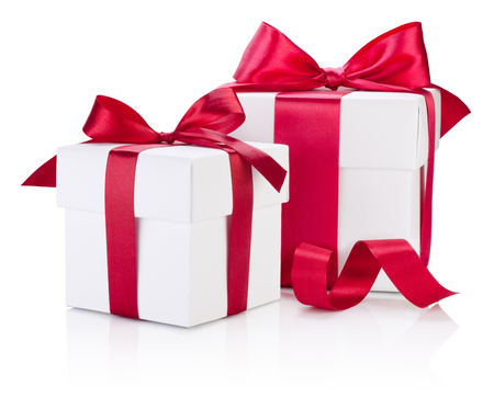Two white gift boxes tied burgundy ribbon bow Isolated on white backgroundの写真素材