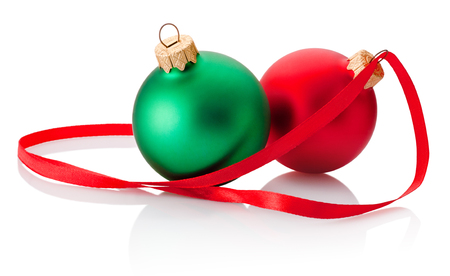 Two Christmas bauble and ribbon isolated on white backgroundの写真素材