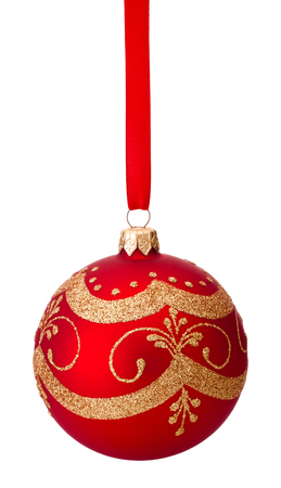Red Christmas decoration bauble hanging on ribbon Isolated on white backgroundの写真素材