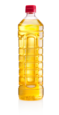 Vegetable or sunflower oil in plastic bottle isolated on white backgroundの写真素材