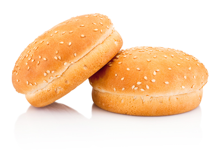 Two hamburger buns with sesame isolated on white backgroundの写真素材