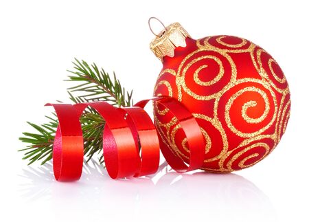 Christmas red decoration bauble, curling paper and fir tree branch Isolated on a white backgroundの写真素材