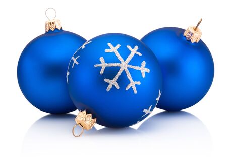 Three blue Christmas decoration bauble with ribbon bow isolated on a white backgroundの写真素材