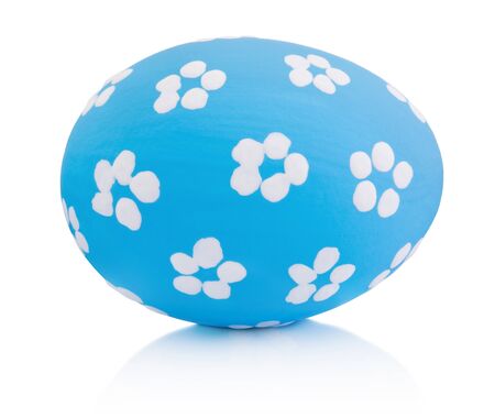 Blue colorful handmade Easter egg isolated on white backgroundの写真素材