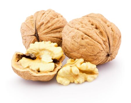 Kernel and whole walnut isolated on a whiteの写真素材