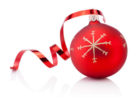 Red Christmas decoration baubles and curling paper Isolated on a white backgroundの写真素材