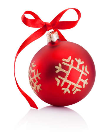 Red Christmas decoration bauble with ribbon bow isolated on white backgroundの写真素材