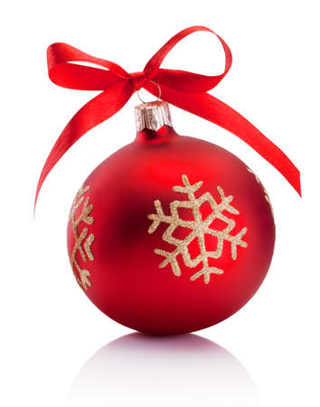 Red Christmas decoration bauble with ribbon bow isolated on a white backgroundの写真素材