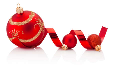 Christmas red decoration baubles and curling paper Isolated on a white backgroundの写真素材