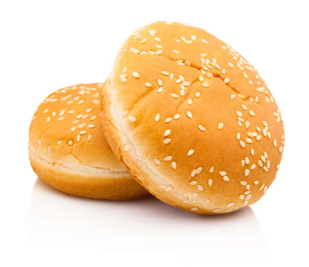 Two hamburger buns with sesame isolated on a white backgroundの写真素材