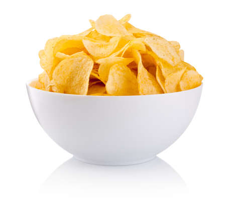 Potato chips in bowl isolated on a white backgroundの写真素材