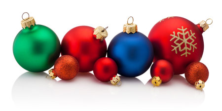 Christmas colored baubles Isolated on a white backgroundの写真素材