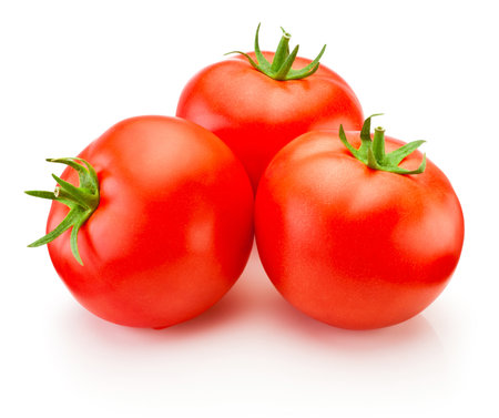 Three ripe red tomatoes isolated on a white backgroundの写真素材