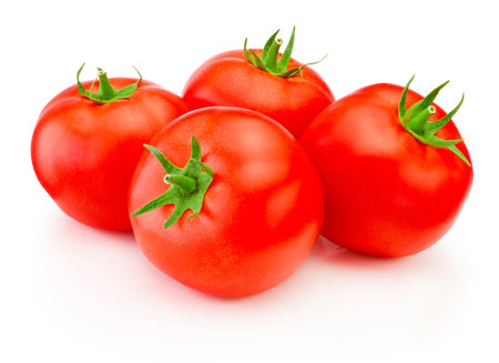 Four ripe red tomatoes isolated on a white backgroundの写真素材
