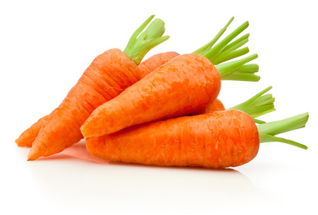Fresh carrots isolated on a white backgroundの写真素材