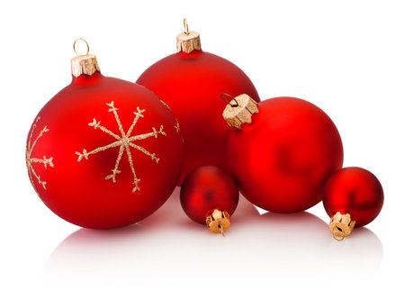 Christmas decoration red baubles isolated on a white backgroundの写真素材